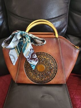 Elegant Tan Leather Handbag with Mandala Detail and Gold Handle